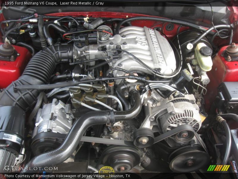 Laser Red Metallic / Gray 1995 Ford Mustang V6 Coupe