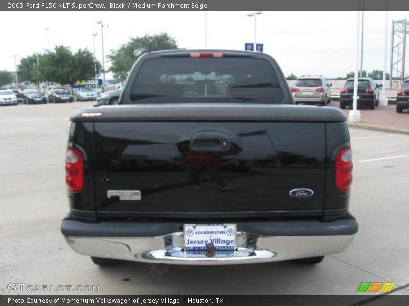 Black / Medium Parchment Beige 2003 Ford F150 XLT SuperCrew