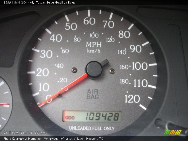 Tuscan Beige Metallic / Beige 1999 Infiniti QX4 4x4