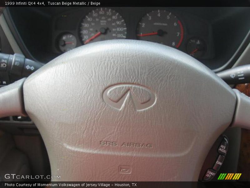 Tuscan Beige Metallic / Beige 1999 Infiniti QX4 4x4