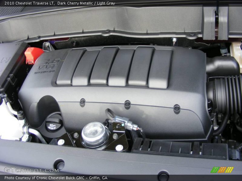 Dark Cherry Metallic / Light Gray 2010 Chevrolet Traverse LT