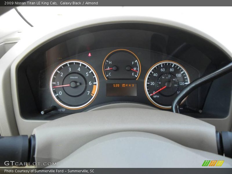 Galaxy Black / Almond 2009 Nissan Titan LE King Cab