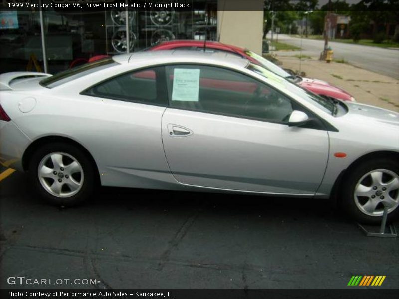 Silver Frost Metallic / Midnight Black 1999 Mercury Cougar V6