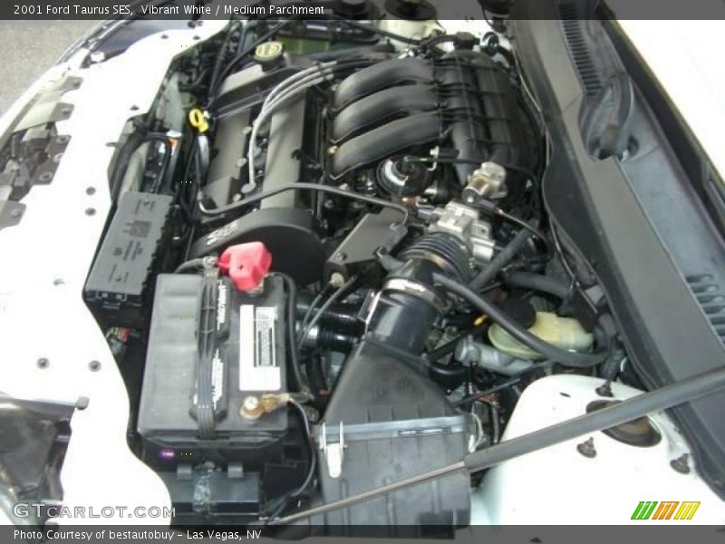 Vibrant White / Medium Parchment 2001 Ford Taurus SES