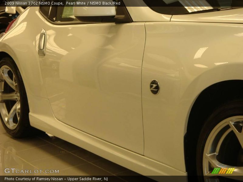 Pearl White / NISMO Black/Red 2009 Nissan 370Z NISMO Coupe
