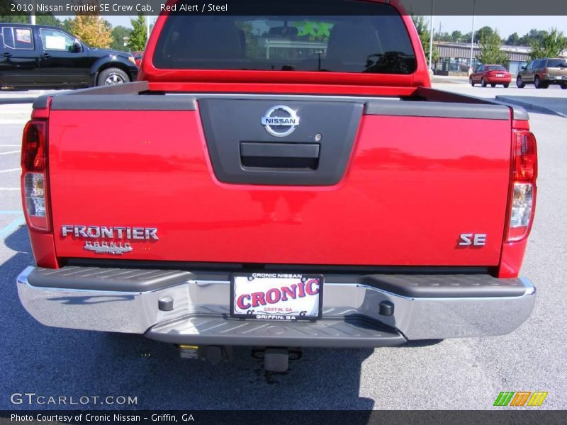 Red Alert / Steel 2010 Nissan Frontier SE Crew Cab