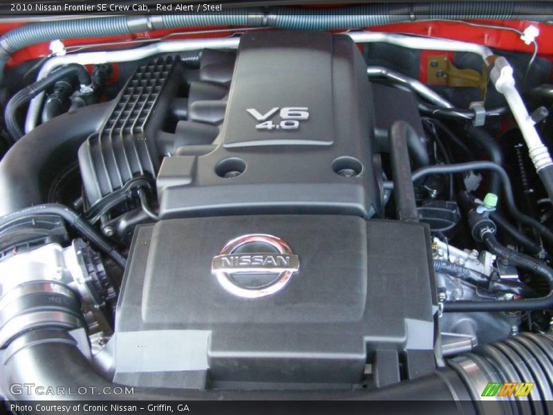 Red Alert / Steel 2010 Nissan Frontier SE Crew Cab
