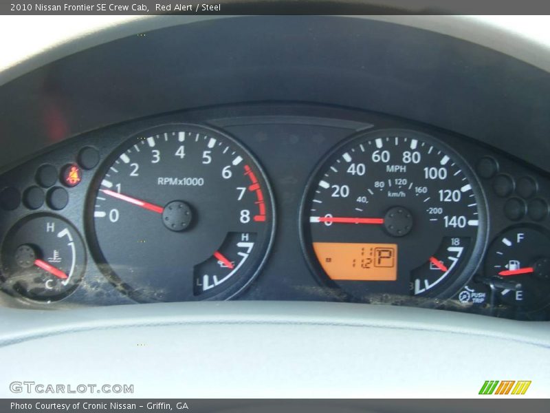 Red Alert / Steel 2010 Nissan Frontier SE Crew Cab