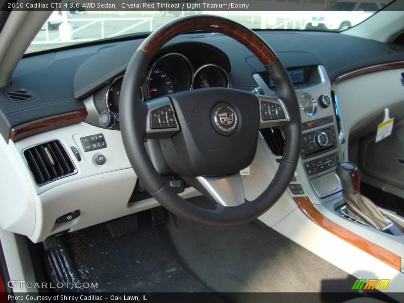 Crystal Red Tintcoat / Light Titanium/Ebony 2010 Cadillac CTS 4 3.0 AWD Sedan