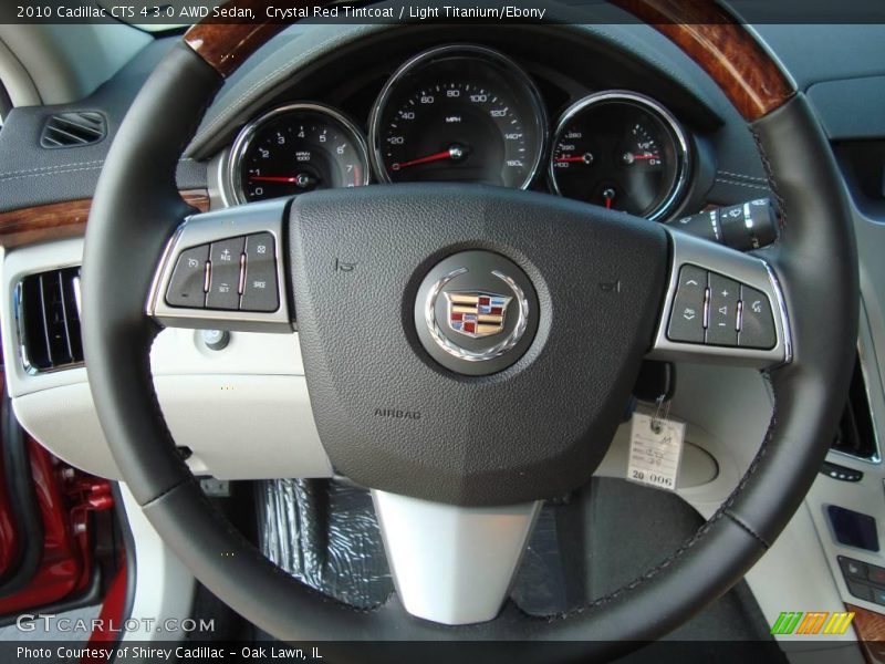 Crystal Red Tintcoat / Light Titanium/Ebony 2010 Cadillac CTS 4 3.0 AWD Sedan