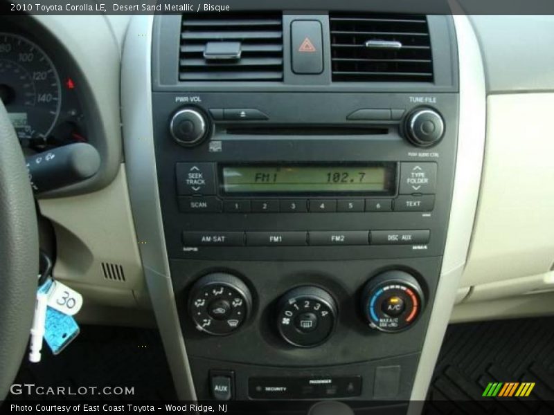 Desert Sand Metallic / Bisque 2010 Toyota Corolla LE