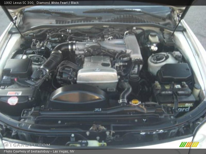 Diamond White Pearl / Black 1992 Lexus SC 300