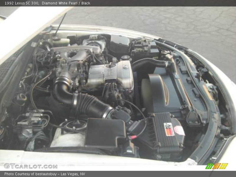 Diamond White Pearl / Black 1992 Lexus SC 300