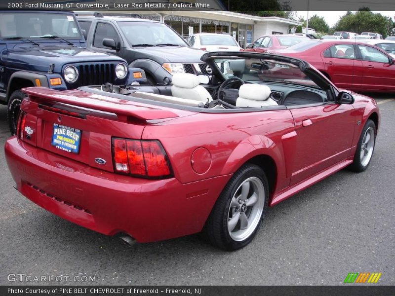 Laser Red Metallic / Oxford White 2002 Ford Mustang GT Convertible