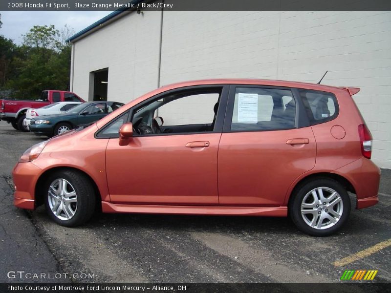 Blaze Orange Metallic / Black/Grey 2008 Honda Fit Sport