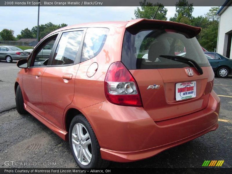 Blaze Orange Metallic / Black/Grey 2008 Honda Fit Sport