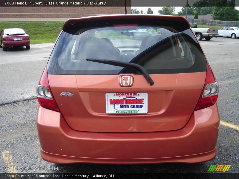 Blaze Orange Metallic / Black/Grey 2008 Honda Fit Sport