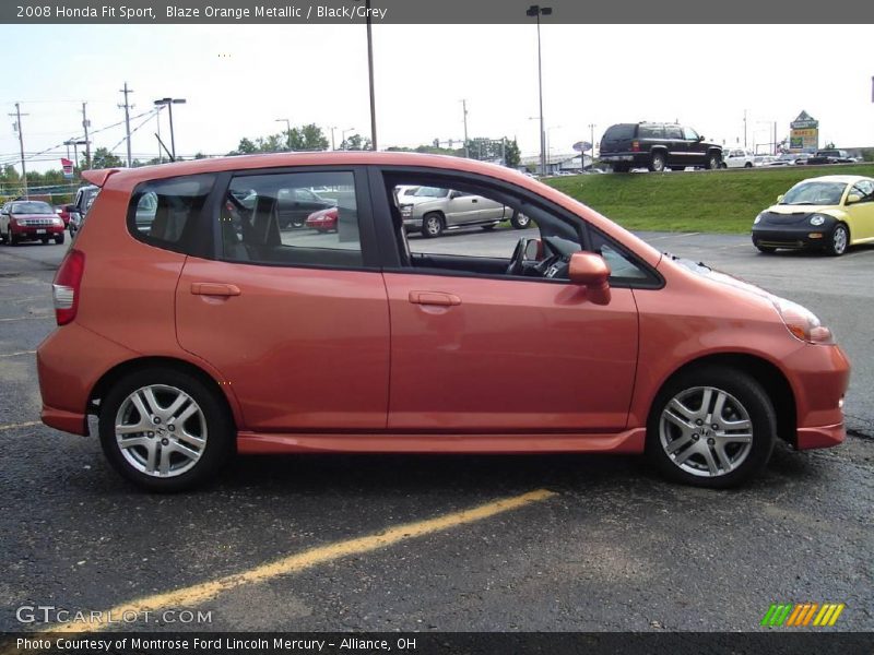Blaze Orange Metallic / Black/Grey 2008 Honda Fit Sport