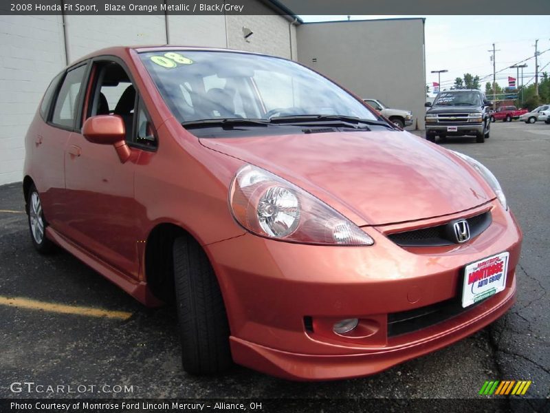 Blaze Orange Metallic / Black/Grey 2008 Honda Fit Sport