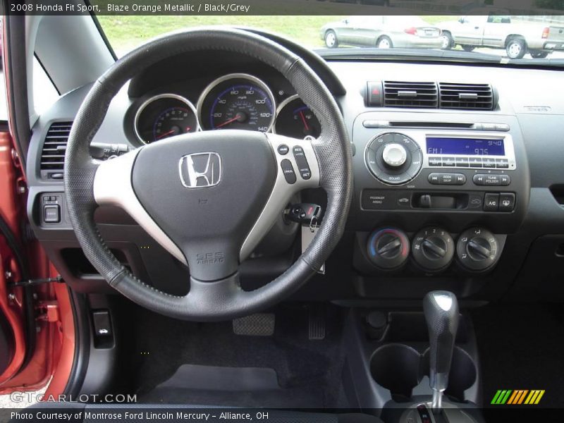 Blaze Orange Metallic / Black/Grey 2008 Honda Fit Sport