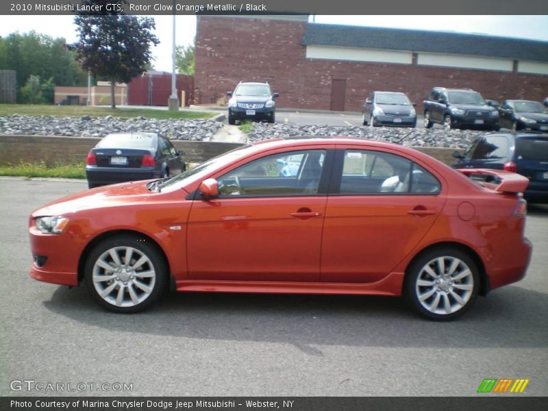 Rotor Glow Orange Metallic / Black 2010 Mitsubishi Lancer GTS