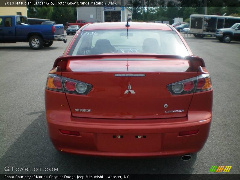 Rotor Glow Orange Metallic / Black 2010 Mitsubishi Lancer GTS
