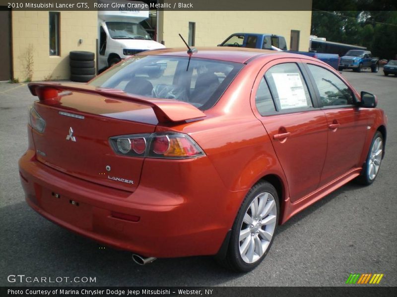 Rotor Glow Orange Metallic / Black 2010 Mitsubishi Lancer GTS