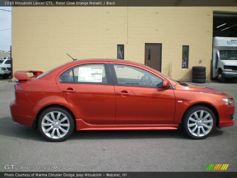 Rotor Glow Orange Metallic / Black 2010 Mitsubishi Lancer GTS