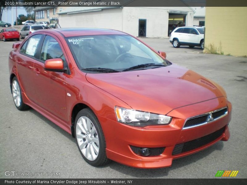 Rotor Glow Orange Metallic / Black 2010 Mitsubishi Lancer GTS