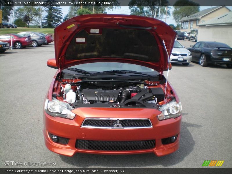 Rotor Glow Orange Metallic / Black 2010 Mitsubishi Lancer GTS