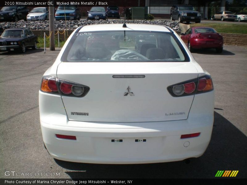 Wicked White Metallic / Black 2010 Mitsubishi Lancer DE