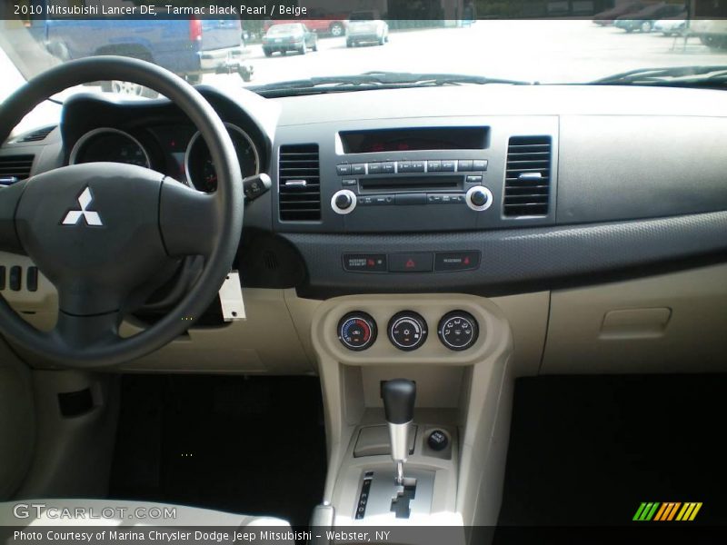 Tarmac Black Pearl / Beige 2010 Mitsubishi Lancer DE