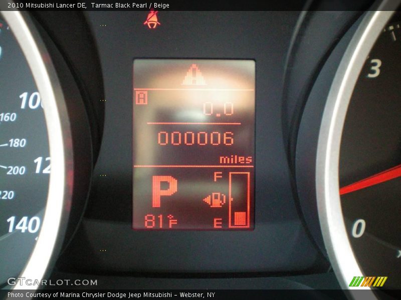Tarmac Black Pearl / Beige 2010 Mitsubishi Lancer DE