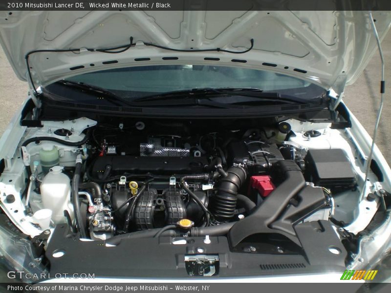 Wicked White Metallic / Black 2010 Mitsubishi Lancer DE