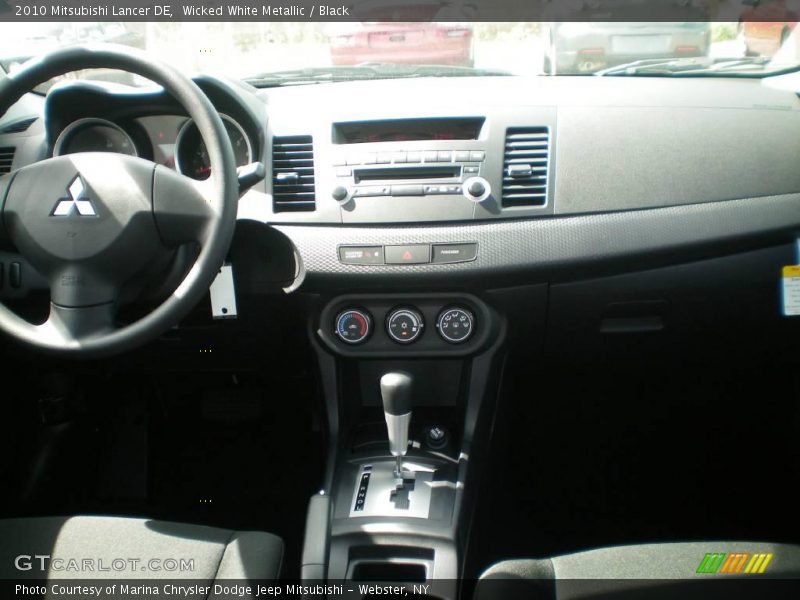 Wicked White Metallic / Black 2010 Mitsubishi Lancer DE