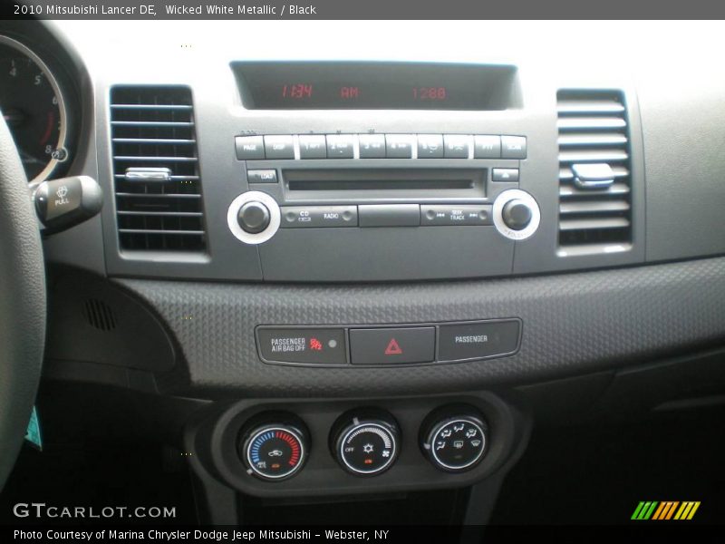 Wicked White Metallic / Black 2010 Mitsubishi Lancer DE