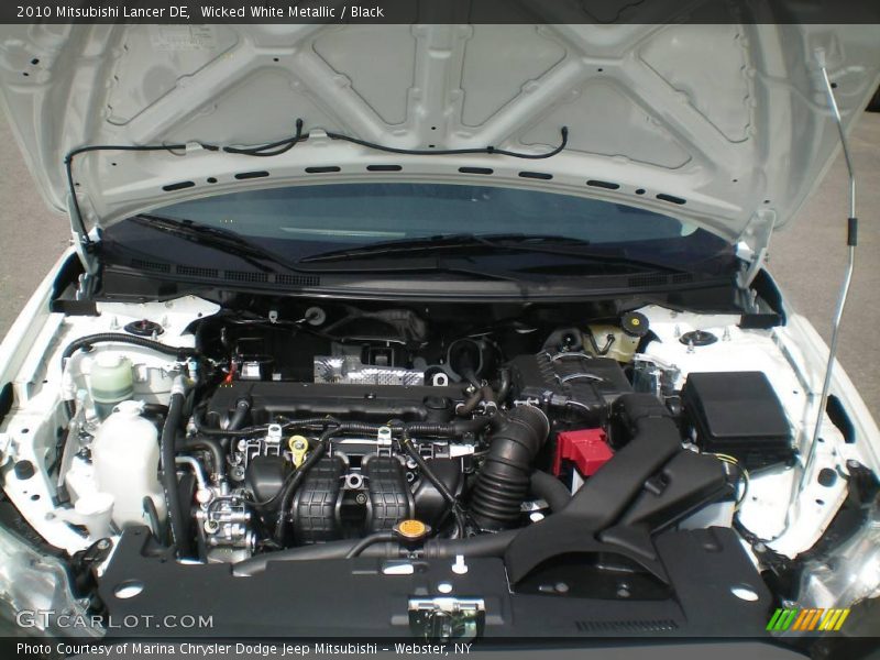 Wicked White Metallic / Black 2010 Mitsubishi Lancer DE