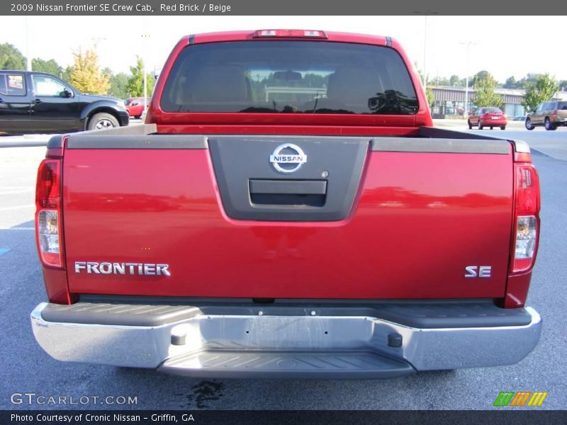 Red Brick / Beige 2009 Nissan Frontier SE Crew Cab