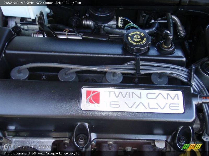 Bright Red / Tan 2002 Saturn S Series SC2 Coupe