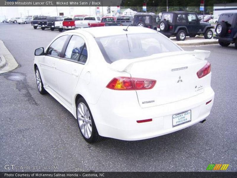 Wicked White Satin / Black 2009 Mitsubishi Lancer GTS