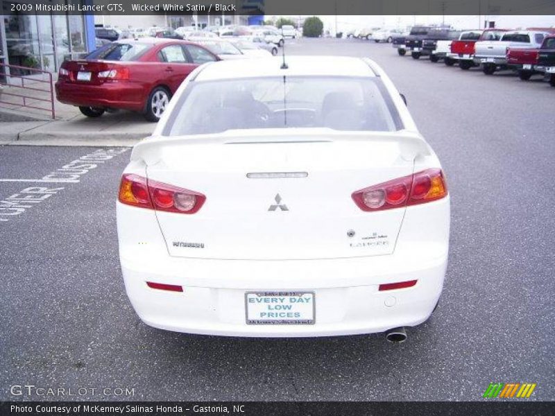 Wicked White Satin / Black 2009 Mitsubishi Lancer GTS