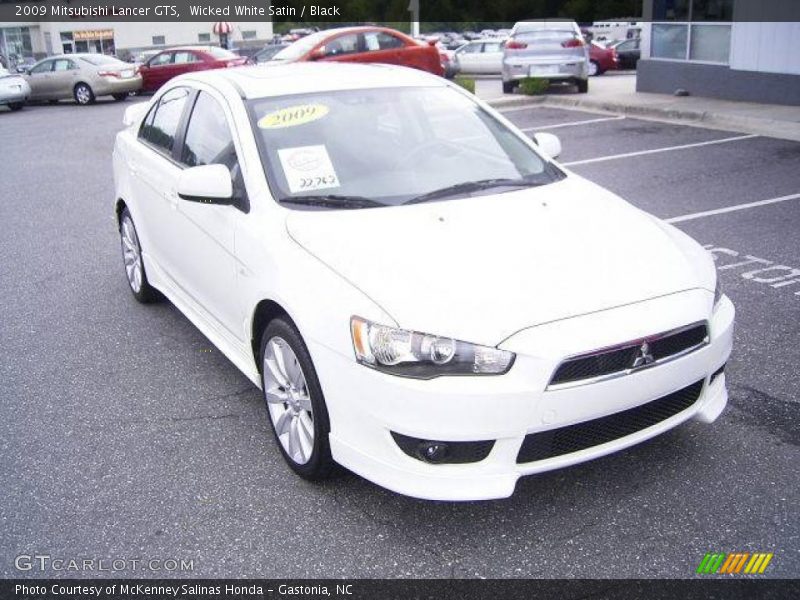 Wicked White Satin / Black 2009 Mitsubishi Lancer GTS