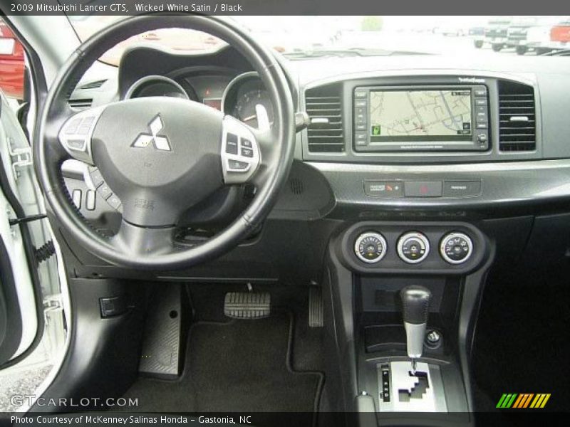 Wicked White Satin / Black 2009 Mitsubishi Lancer GTS
