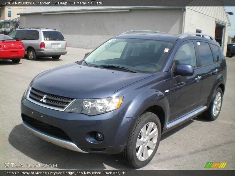 Deep Blue Metallic / Black 2009 Mitsubishi Outlander SE
