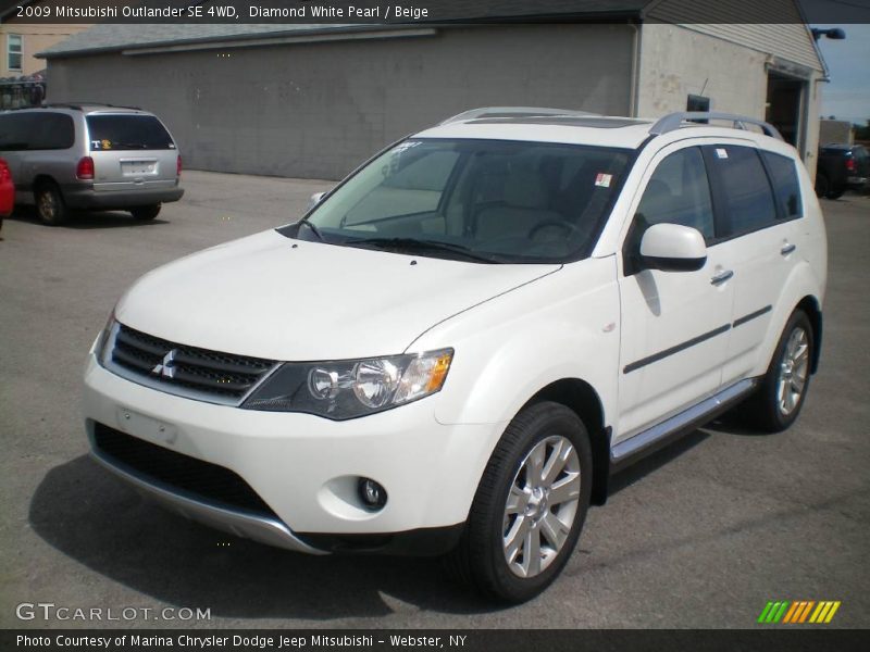 Diamond White Pearl / Beige 2009 Mitsubishi Outlander SE 4WD