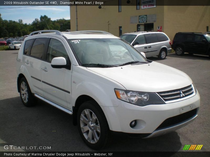 Diamond White Pearl / Beige 2009 Mitsubishi Outlander SE 4WD