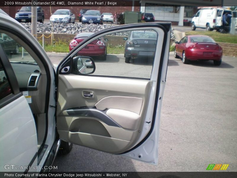 Diamond White Pearl / Beige 2009 Mitsubishi Outlander SE 4WD