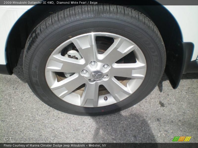 Diamond White Pearl / Beige 2009 Mitsubishi Outlander SE 4WD