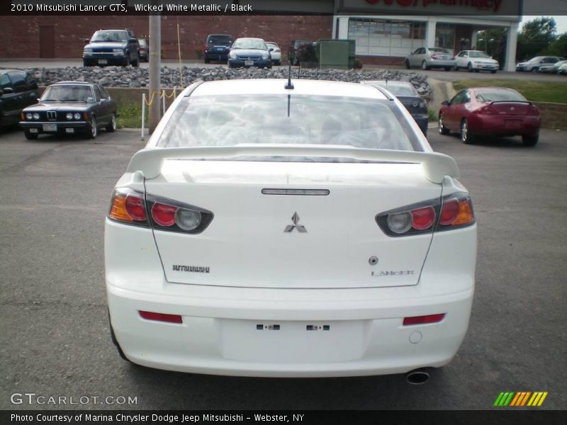 Wicked White Metallic / Black 2010 Mitsubishi Lancer GTS