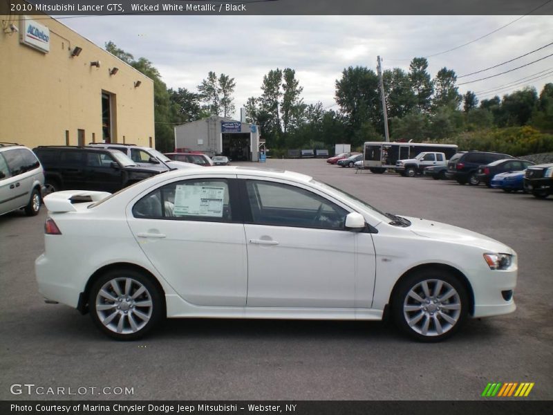 Wicked White Metallic / Black 2010 Mitsubishi Lancer GTS